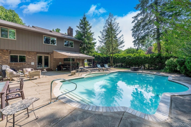 5156 Chestershire Ct, West Bloomfield, MI 48322 - view of pool featuring a patio and an outdoor living space