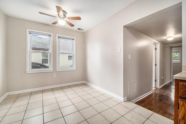 81 Chopin Ave, Troy, MI 48083 - empty room with ceiling fan and wood finished floors