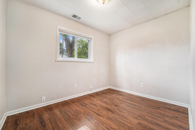 81 Chopin Ave, Troy, MI 48083 - empty room with dark wood finished floors and baseboards