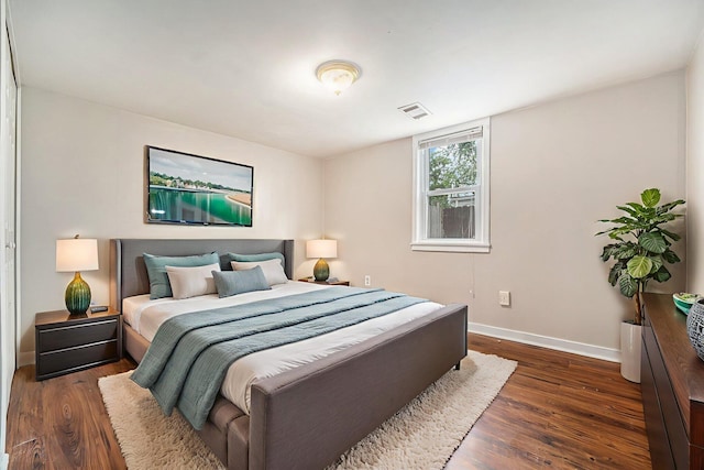 81 Chopin Ave, Troy, MI 48083 - bedroom with dark wood-style flooring and baseboards