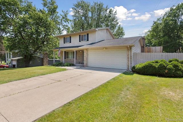 1337 Heathercrest Dr, Flint, MI 48532 - traditional home with a garage, driveway, and a shingled roof