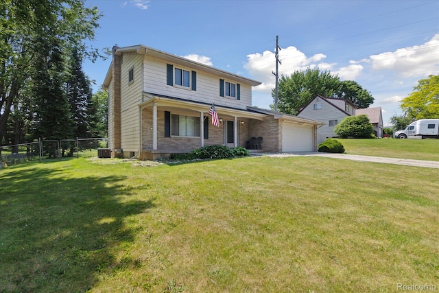 1337 Heathercrest Dr, Flint, MI 48532 - traditional-style house with a garage, driveway, and brick siding