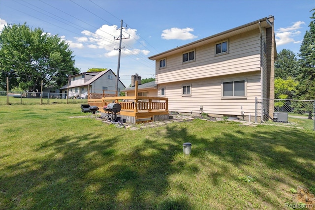 1337 Heathercrest Dr, Flint, MI 48532 - rear view of house with a deck