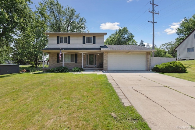1337 Heathercrest Dr, Flint, MI 48532 - traditional home featuring an attached garage, concrete driveway, covered porch, and brick siding