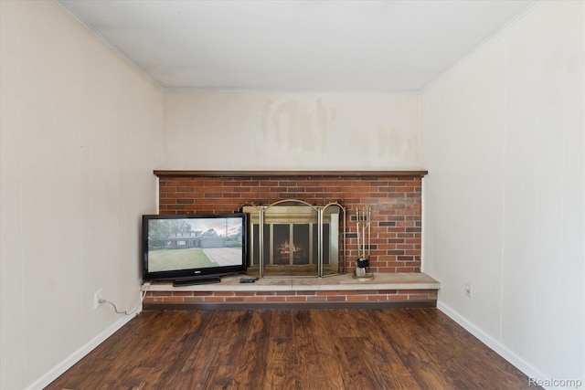 1337 Heathercrest Dr, Flint, MI 48532 - detailed view of a brick fireplace, wood finished floors, and crown molding