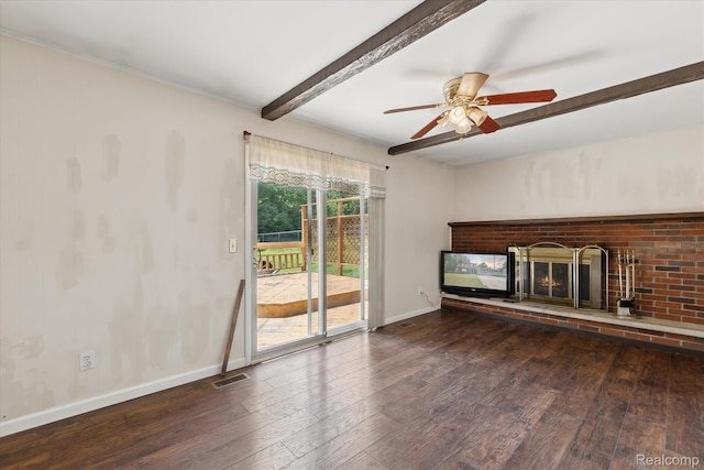1337 Heathercrest Dr, Flint, MI 48532 - unfurnished living room featuring beam ceiling, wood-type flooring, a brick fireplace, and ceiling fan