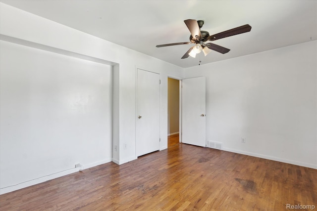 1337 Heathercrest Dr, Flint, MI 48532 - spare room with wood finished floors and a ceiling fan
