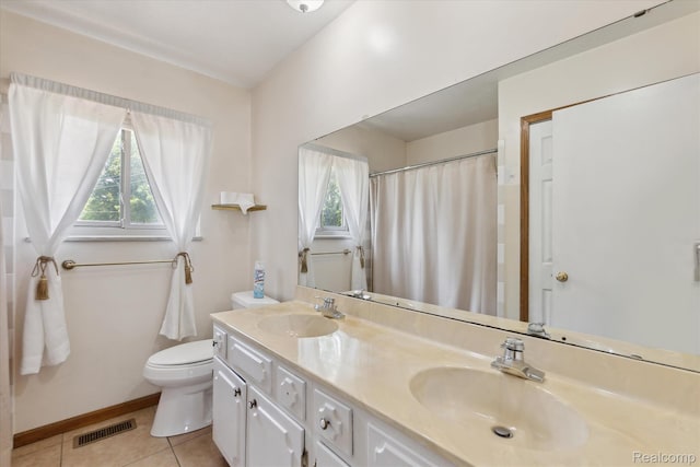 1337 Heathercrest Dr, Flint, MI 48532 - full bath with tile patterned floors, double vanity, and a shower with shower curtain