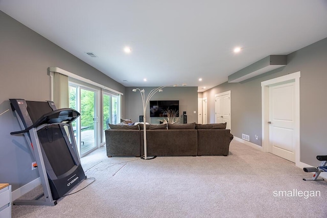 6853 Loggers Ridge Run SE, Caledonia, MI 49316 - living room featuring light colored carpet and recessed lighting