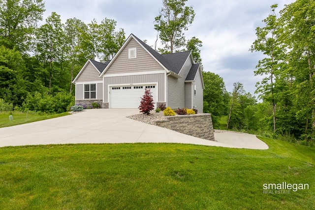 6853 Loggers Ridge Run SE, Caledonia, MI 49316 - craftsman house featuring board and batten siding, stone siding, a front lawn, and a garage