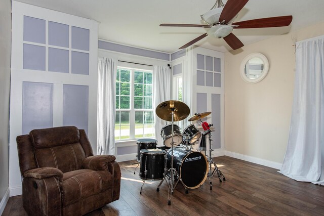 185 Race St, Constantine, MI 49042 - living area featuring dark wood-style flooring and a ceiling fan
