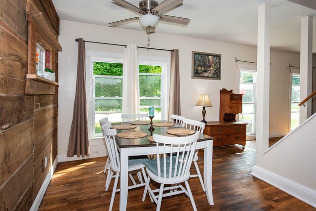 185 Race St, Constantine, MI 49042 - dining space with dark wood-type flooring and a ceiling fan