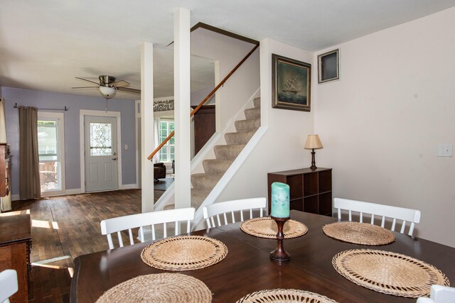 185 Race St, Constantine, MI 49042 - dining area with ceiling fan, stairs, and wood finished floors