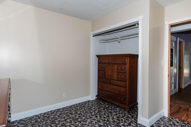 185 Race St, Constantine, MI 49042 - bedroom featuring baseboards and dark floors