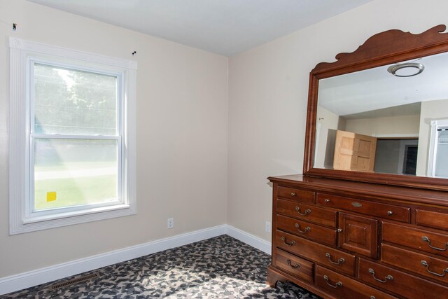185 Race St, Constantine, MI 49042 - bedroom featuring baseboards and tile patterned floors