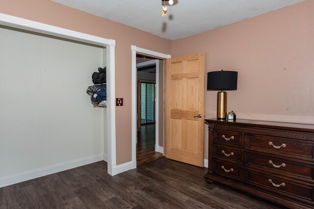 185 Race St, Constantine, MI 49042 - bedroom featuring dark wood-type flooring and baseboards