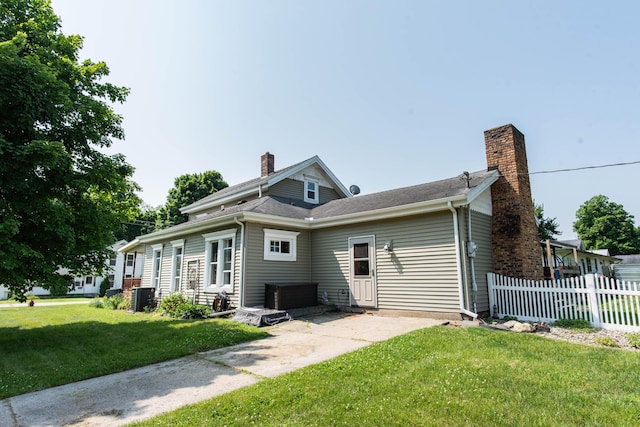185 Race St, Constantine, MI 49042 - back of property with a chimney