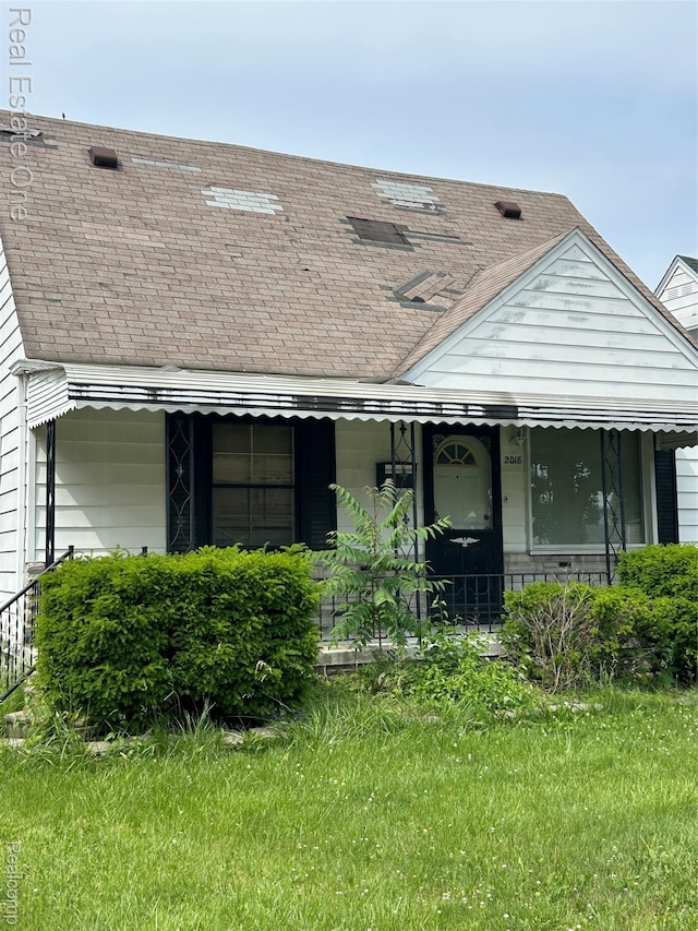 2018 Goddard Rd, Lincoln Park, MI 48146 - view of front facade featuring a shingled roof