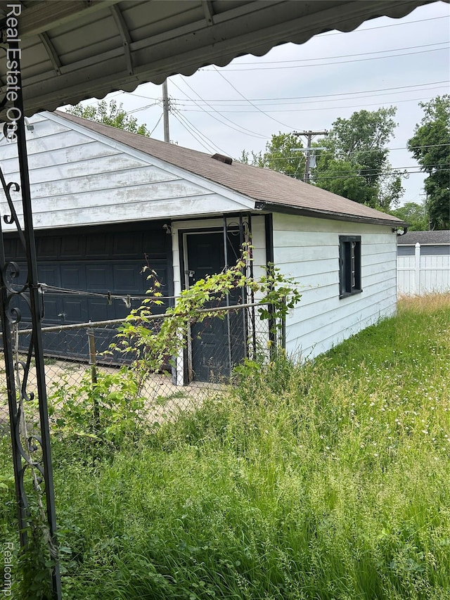 2018 Goddard Rd, Lincoln Park, MI 48146 - view of home's exterior featuring a garage