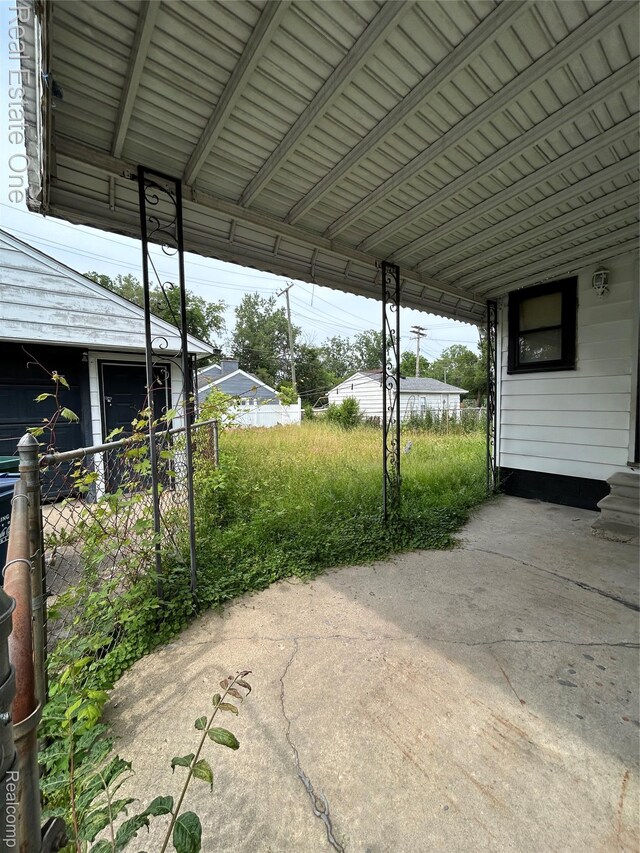 2018 Goddard Rd, Lincoln Park, MI 48146 - view of vehicle parking with an attached carport