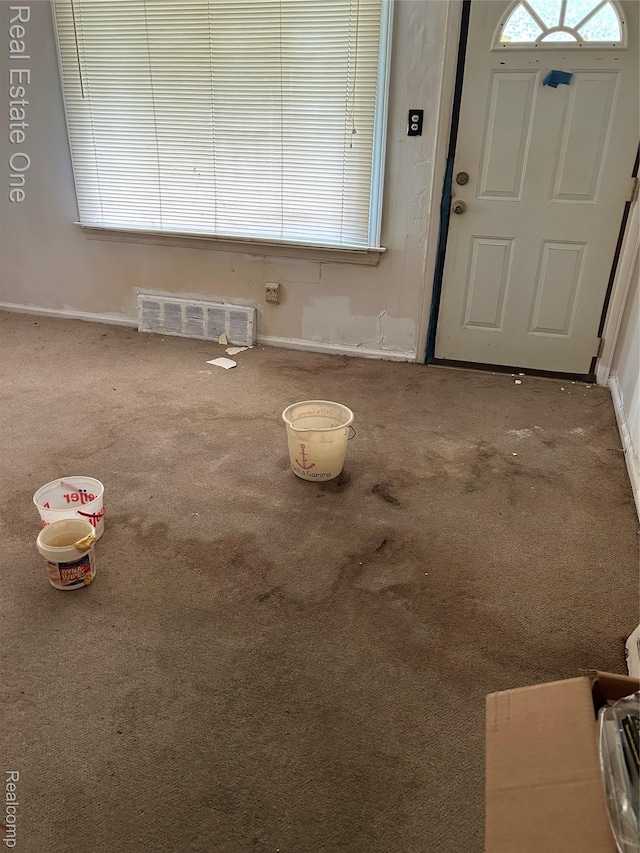 2018 Goddard Rd, Lincoln Park, MI 48146 - foyer featuring carpet floors and baseboards
