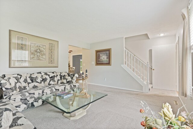 429 Zehnder Dr, Frankenmuth, MI 48734 - living room featuring stairway and carpet flooring