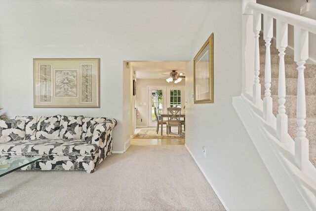 429 Zehnder Dr, Frankenmuth, MI 48734 - carpeted living room with baseboards and stairs
