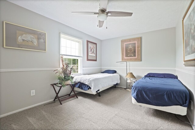 429 Zehnder Dr, Frankenmuth, MI 48734 - carpeted bedroom featuring a ceiling fan and baseboards