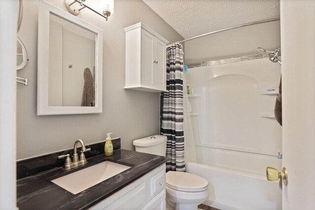 429 Zehnder Dr, Frankenmuth, MI 48734 - bathroom featuring vanity, a textured ceiling, and shower / tub combo