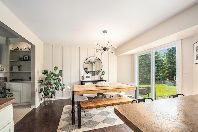 426 Meadowind Ct, Pinckney, MI 48169 - dining space with wood finished floors and a chandelier