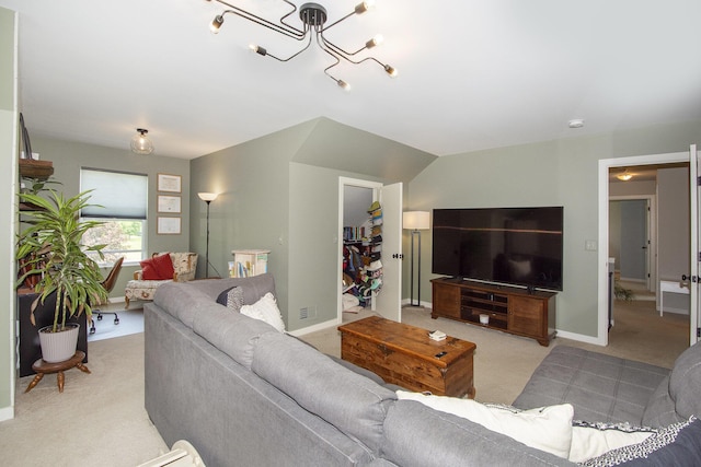 426 Meadowind Ct, Pinckney, MI 48169 - living room featuring light carpet and a chandelier