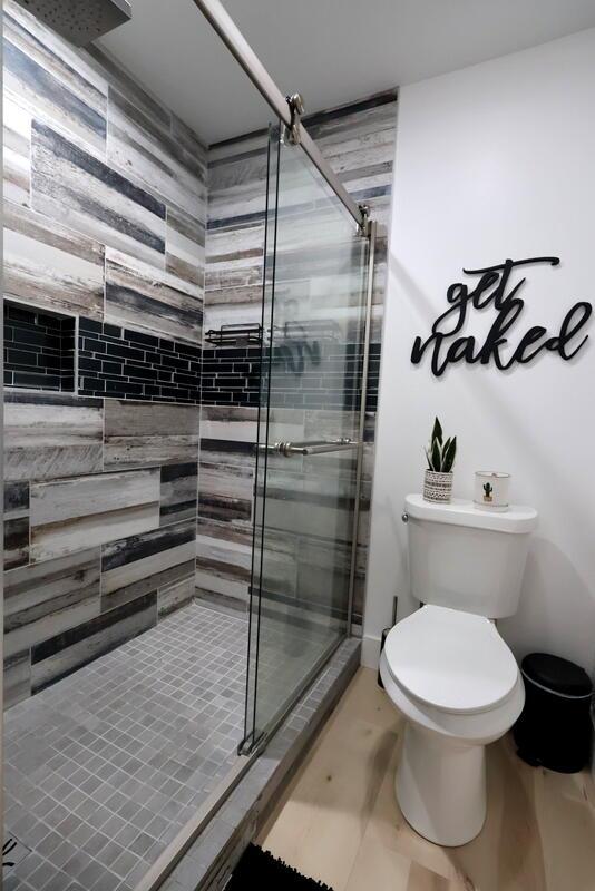 103 Cottonwood Ct, Litchfield, MI 49252 - full bath with a stall shower and toilet