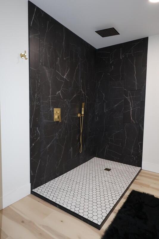 103 Cottonwood Ct, Litchfield, MI 49252 - full bath with a marble finish shower and wood finished floors