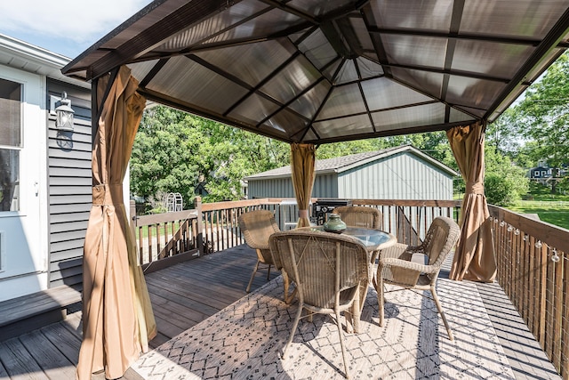 3360 Broad St, Dexter, MI 48130 - wooden terrace with outdoor dining area and a gazebo