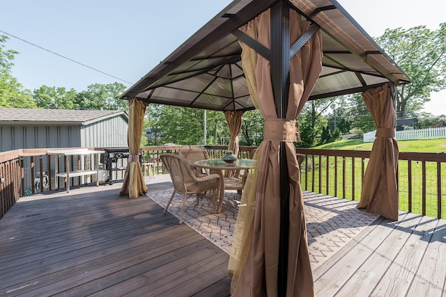 3360 Broad St, Dexter, MI 48130 - deck with a gazebo, outdoor dining area, and a yard