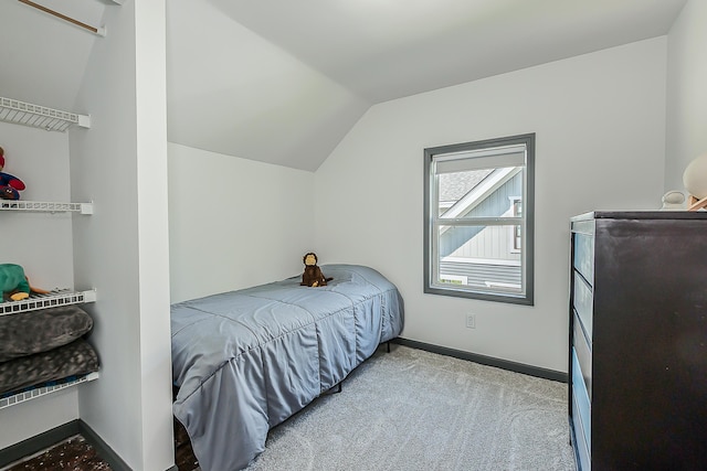 3360 Broad St, Dexter, MI 48130 - carpeted bedroom with vaulted ceiling and baseboards