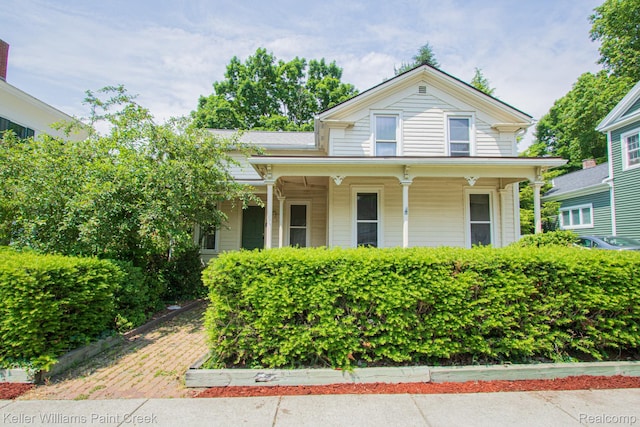 235 E Saint Clair St, Almont, MI 48003 - view of front of home with covered porch