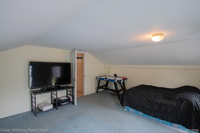 235 E Saint Clair St, Almont, MI 48003 - bedroom featuring vaulted ceiling and carpet flooring