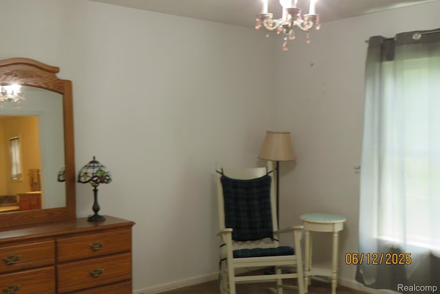 10571 Baraga St, Taylor, MI 48180 - living area with a chandelier and baseboards