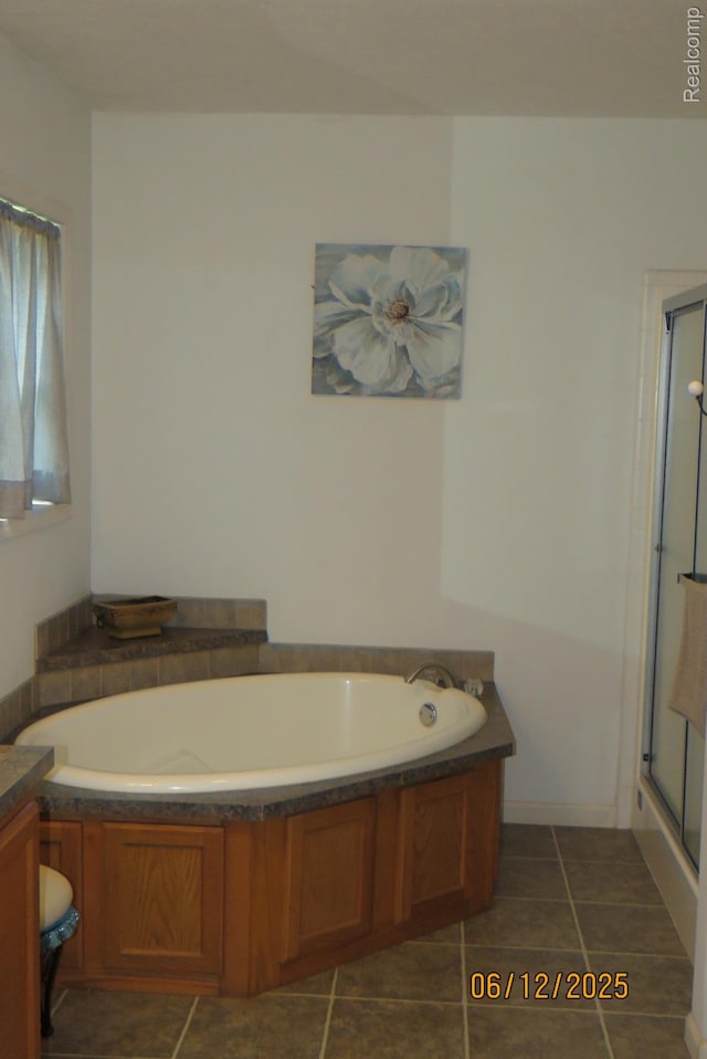10571 Baraga St, Taylor, MI 48180 - bathroom with a bath, a stall shower, tile patterned floors, and vanity