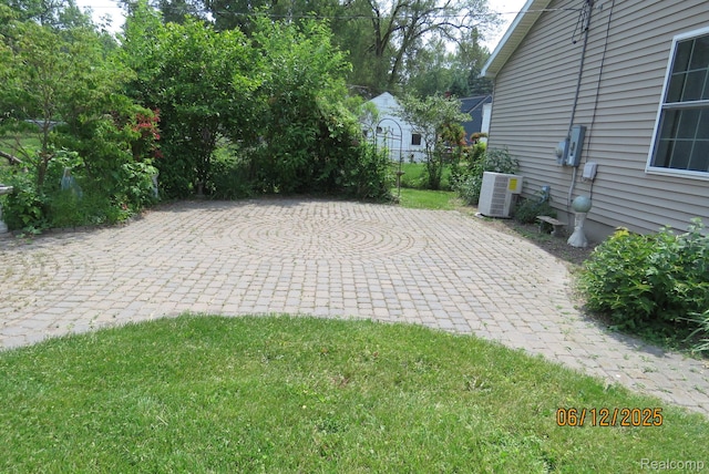 10571 Baraga St, Taylor, MI 48180 - view of patio / terrace featuring driveway