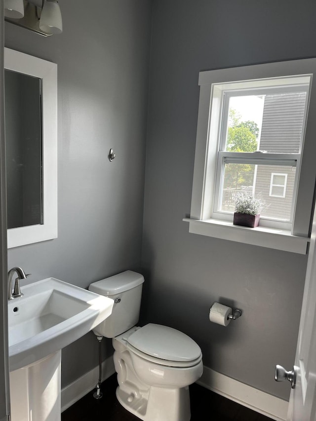727 Wild Flower Ct, Wayland, MI 49348 - half bath featuring baseboards and toilet