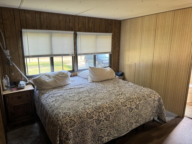 1321 Ziggy Rd, Farwell, MI 48622 - bedroom with wood finished floors and wood walls
