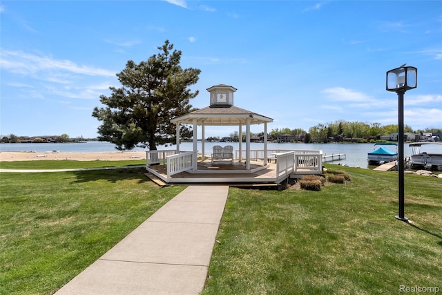3565 Port Cove Dr Unit 68, Waterford, MI 48328 - dock featuring a gazebo, a water view, and a lawn