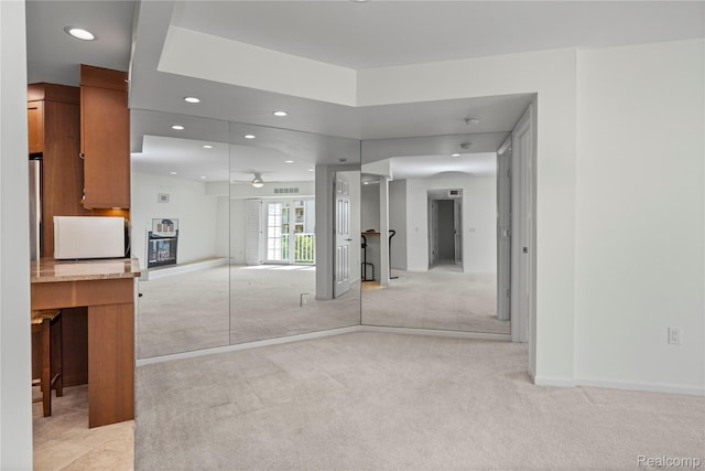 3565 Port Cove Dr Unit 68, Waterford, MI 48328 - unfurnished living room featuring light carpet and recessed lighting