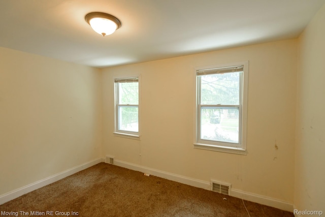 11954 Timken Ave, Warren, MI 48089 - carpeted spare room with baseboards