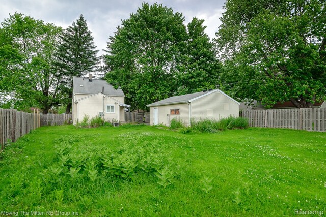 11954 Timken Ave, Warren, MI 48089 - fenced backyard featuring an outbuilding