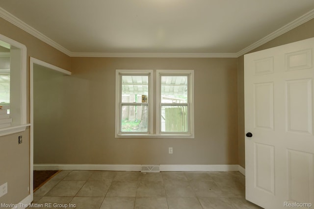 11954 Timken Ave, Warren, MI 48089 - spare room featuring crown molding and light tile patterned floors