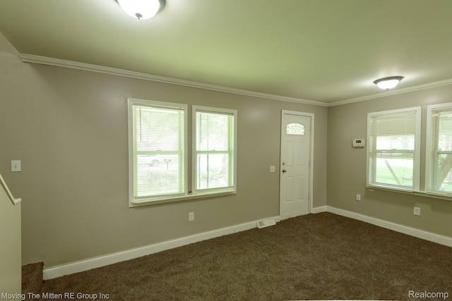 11954 Timken Ave, Warren, MI 48089 - entrance foyer featuring crown molding and dark carpet