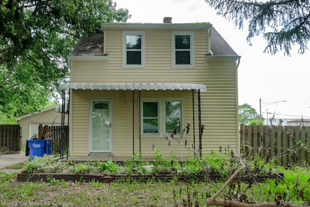 11954 Timken Ave, Warren, MI 48089 - view of front of house with a chimney